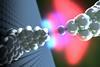 Atomic configuration of the microscope tip interacting with the molecule on the surface. The very weak measured interaction energy is a result of the molecular hydrogens' interplay with the tip electrostatic potential (negative (red) and positive (blue)).