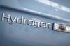 An image showing hydrogen writing in relief on car