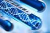 A digital illustration of a DNA molecule in a test tube