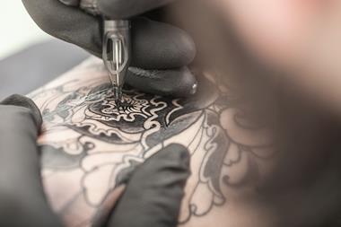 Tattoo being drawn
