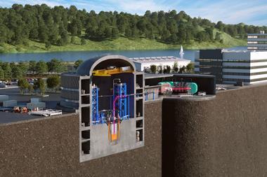 A digital model of a nuclear power station showing a particle accelerator next to the reactor