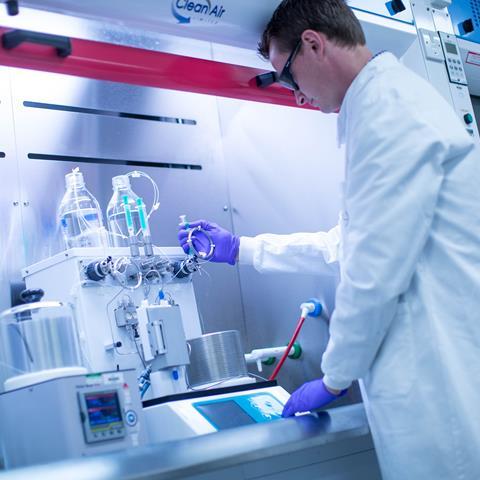 A researcher working in a lab